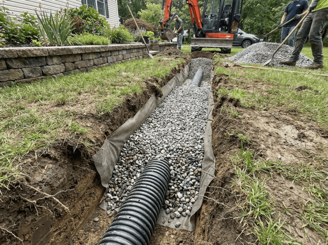 Professional French Drain installation for residential water management in Sour Lake, designed by licensed drainage specialists at Olguin Bros. Landscaping.